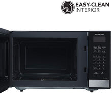 Load image into Gallery viewer, PANASONIC 0.9 CU FT Black &amp; Stainless Steel Microwave - Refurbished with Home Essentials warranty - NN-SG458S
